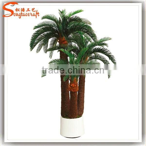Artificial Mini palm trees and palm tree landscaping