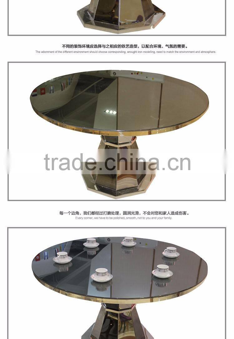 Upholstered stainless steel goldedn glass surface table for sale