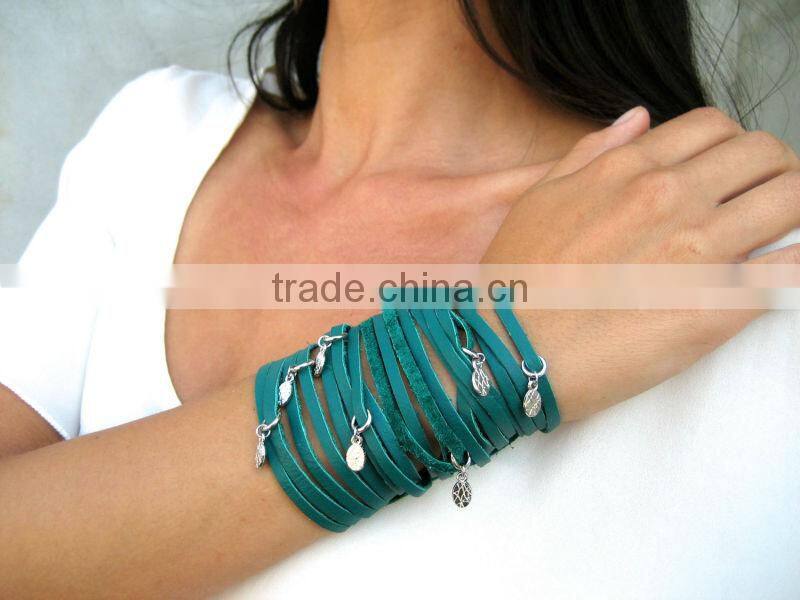 sliced leather bracelet, wide Leather Cuff - Charms Bracelet, Multi Strap Bracelet with peace and gun charms