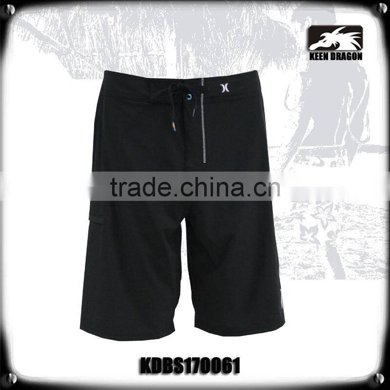 4 way stretch solid black board shorts