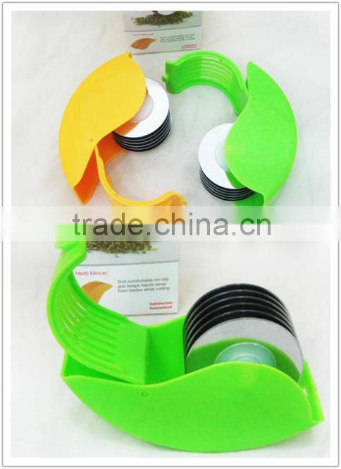Vegetable slicer / roller cutter / rolling herb mincer as seen on TV