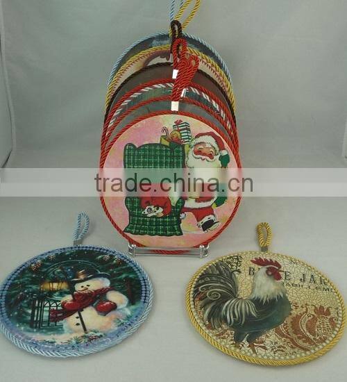 Ceramic trivet with rope and cork back cartoon design
