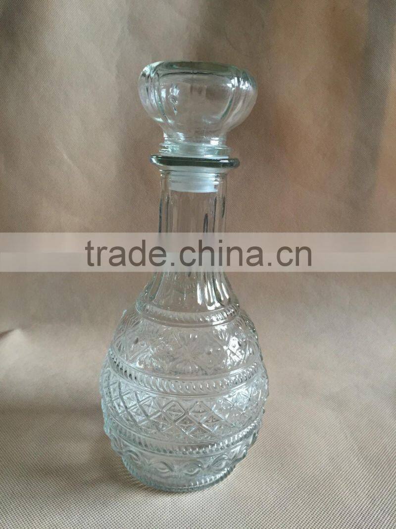 Beautiful glass wine bottle , glass bottle , glass bottle with lid , glassware