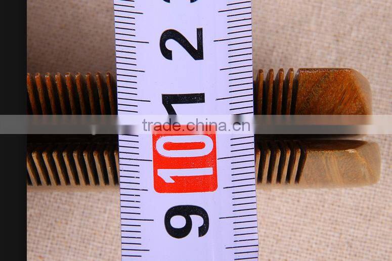 Both sides of wooden comb;comb
