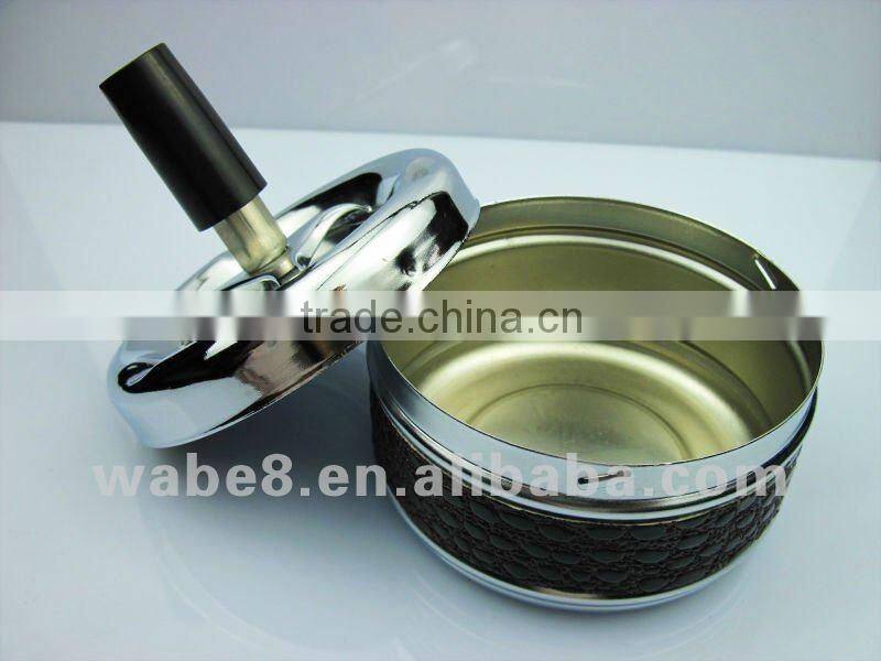 aluminum ashtray with spin lid and covered with stick wood leather