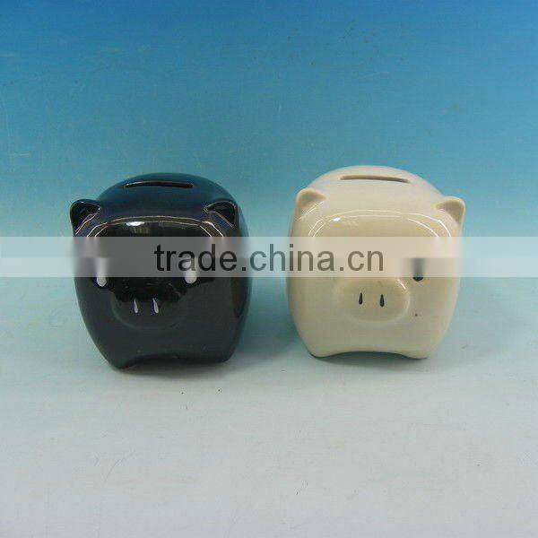 White and black ceramic piggy bank