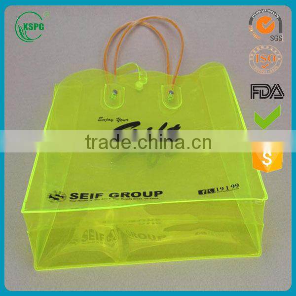 Pvc packaging hand bag with flexiloop handle