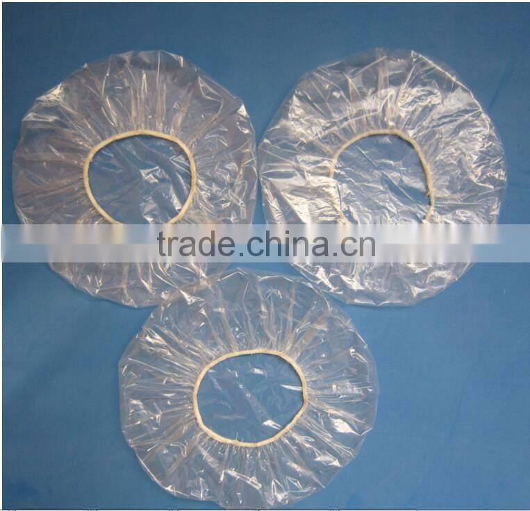 Disposable plastic hand made round shower cap