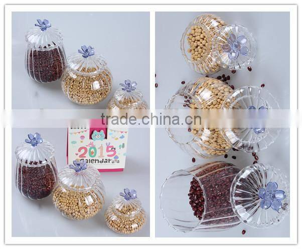 china hot sale factory fashionable design glass food container jar with flower shape lid painted blue
