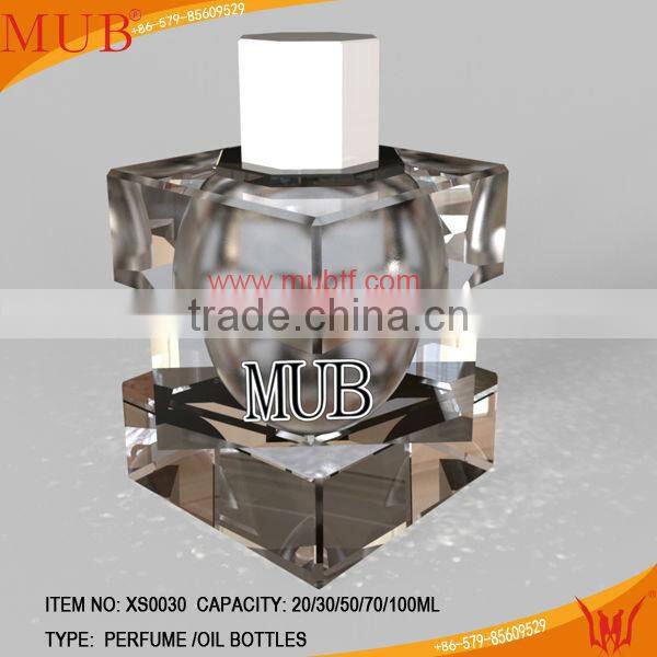clear perfume bottle with beatiful cuts