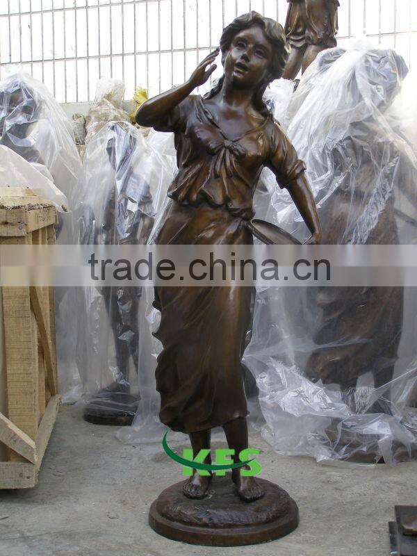 Singing bronze lady figure