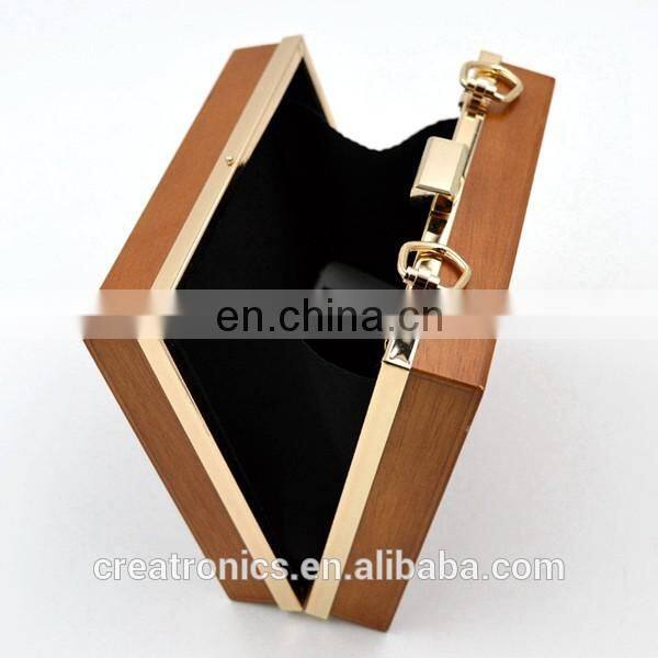 CR Factory OEM acceptable engraving patterns hollowed-out design metal frame long chain rectangled shaped wooden box clutch bag