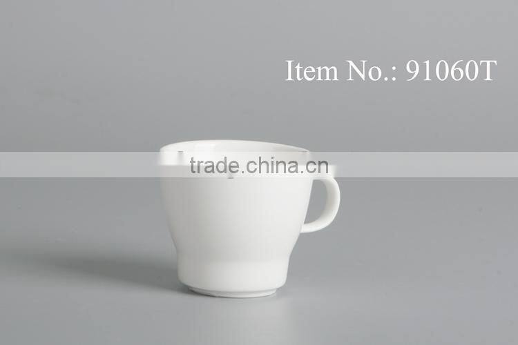 white porcelain tea cup with handle