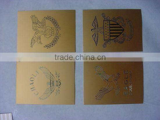 metal labels with decorative patterns