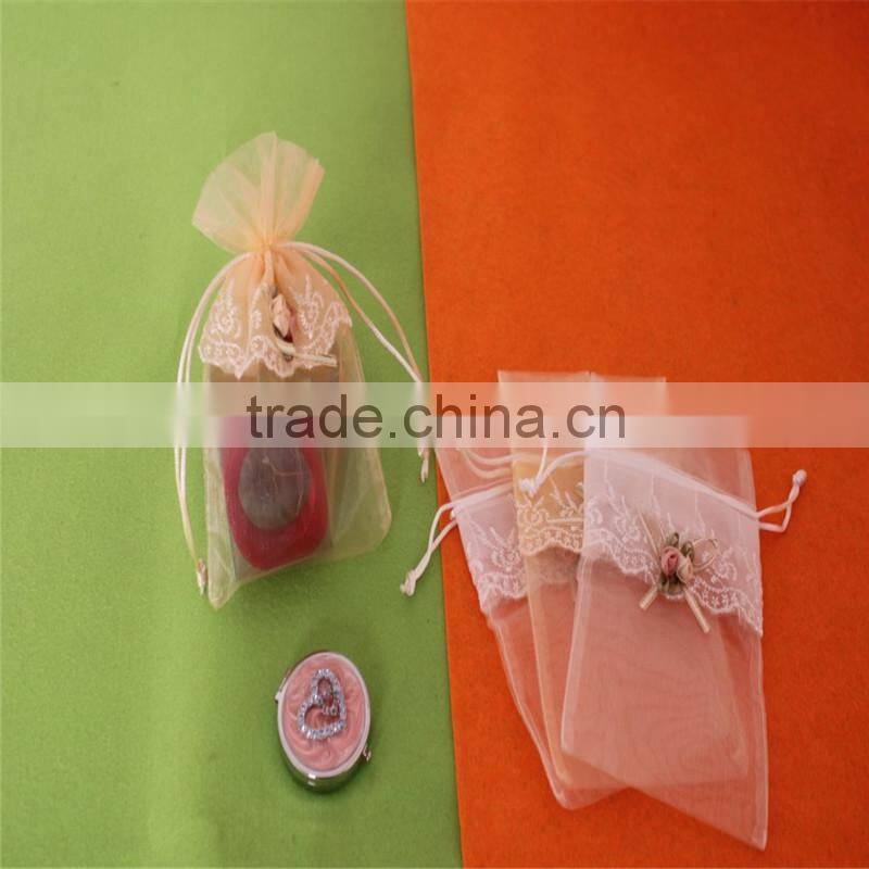 China cheap drawstring organza gift bags with logo ribbon