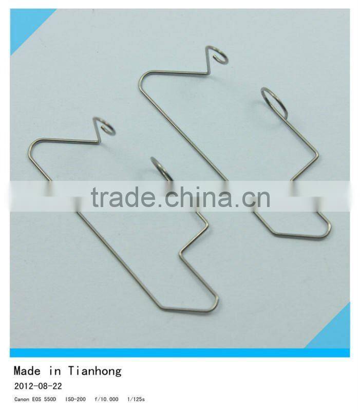 Wire forming spring made of carbon steel