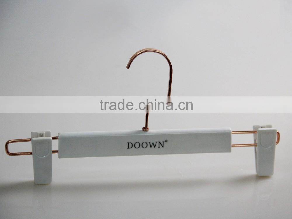white plastic clothes hanger suit hanger