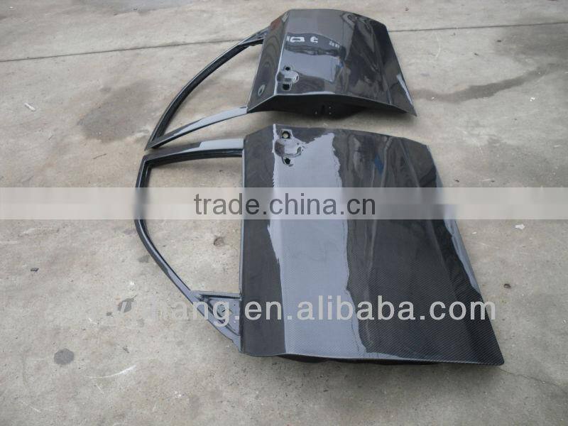 carbon fiber door before and after for GRB STI