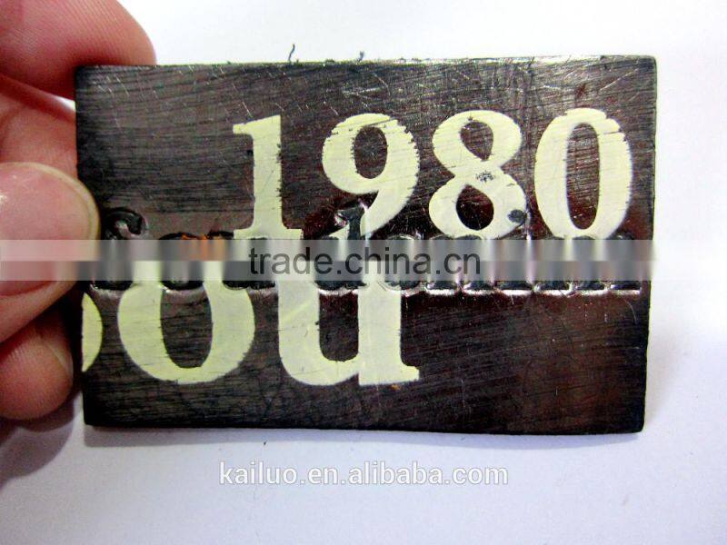 Embossed logo leather label for jeans