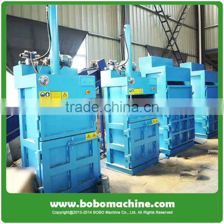 Vertical baler for used clothing