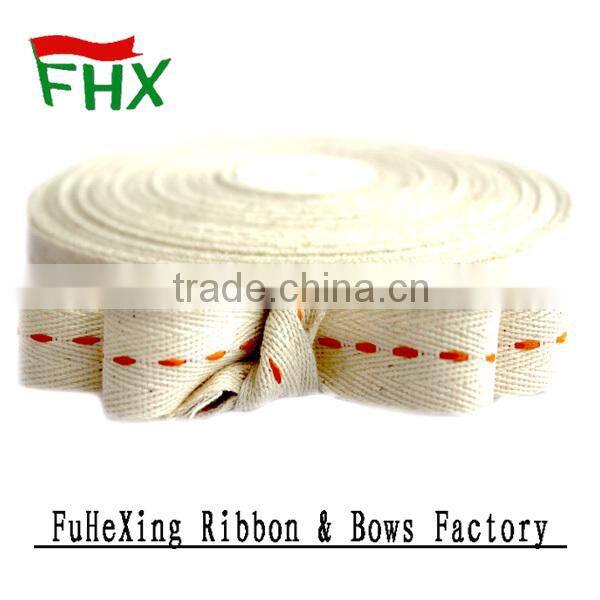 cushions embroidered with curly ribbon