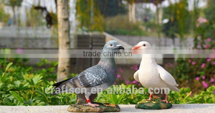 christmas pigeon statues