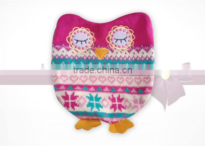 hot water bottle with owl knitted cover