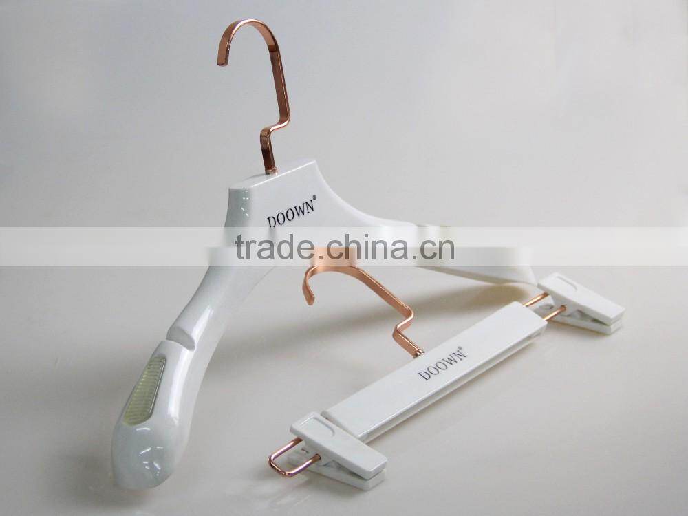 white plastic clothes hanger suit hanger