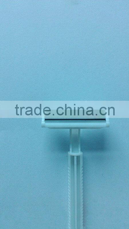 white disposable twin blade razor with 6g shaving cream