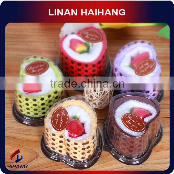 China OEM manufacture hot selling 100% cotton towel cake souvenir