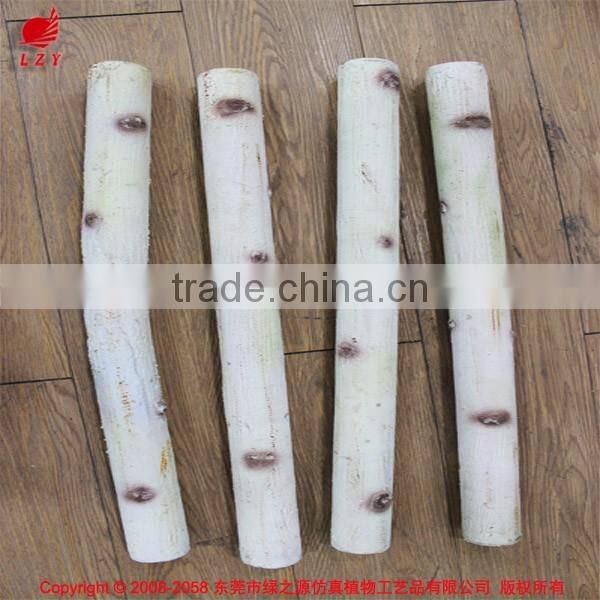 Natural look artificial birch tree trunks