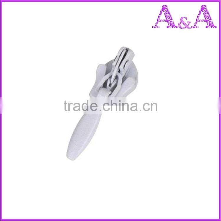 A quality grade wholesale electroplate A/L nylon zipper slider with beautiful puller for different style customized is welcomed
