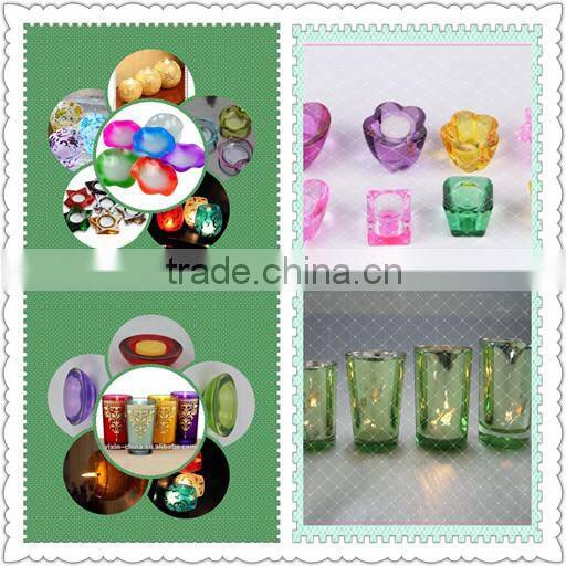 spraying green color tealight glass candle holder holiday decoration in valentines day
