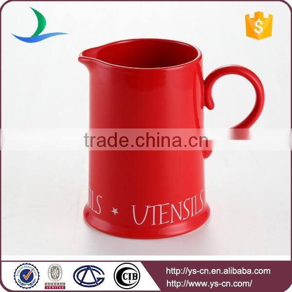 Red ceramic water jug for home or hotel