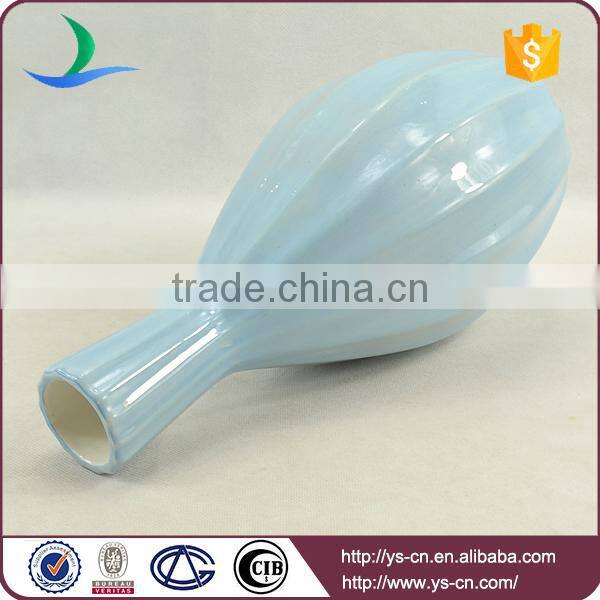 matt blue ceramic vase painted by hand for hotel decoration