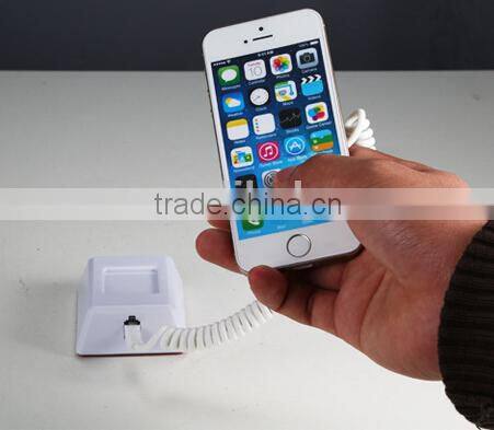 Security alarm charge retail display system for mobile phone