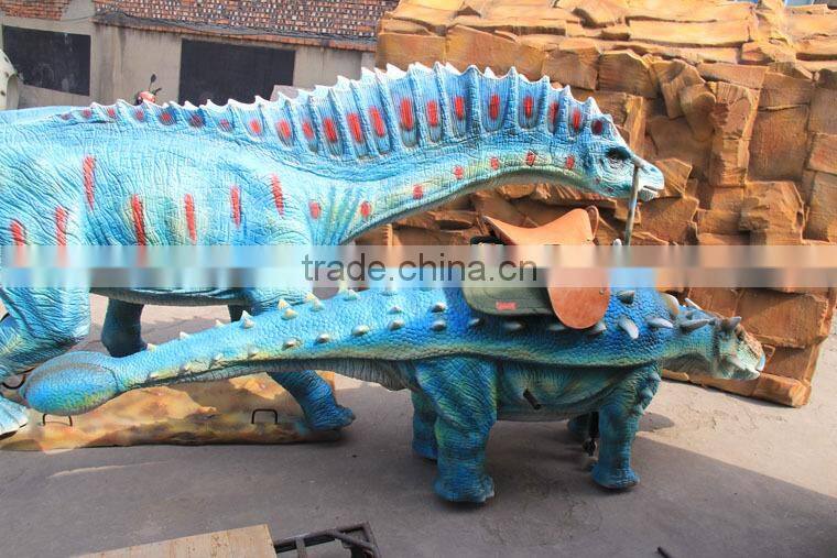Amusement park facility riding and roaring dinosaur