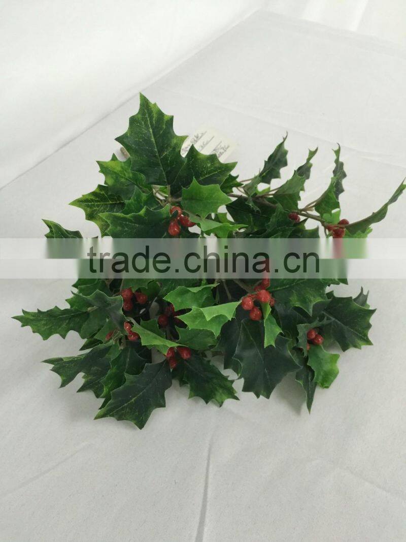 Artificial holly plant branch with red berries for xmas decoration