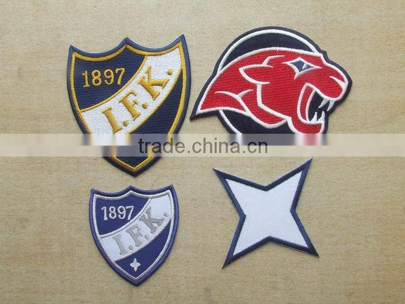 factory made personalized design 100% embroidery uniform textile patches with self adhensive backside