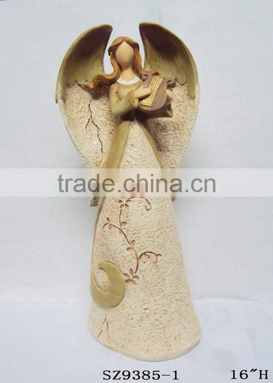 Resin fairy with a snail statue sculpture