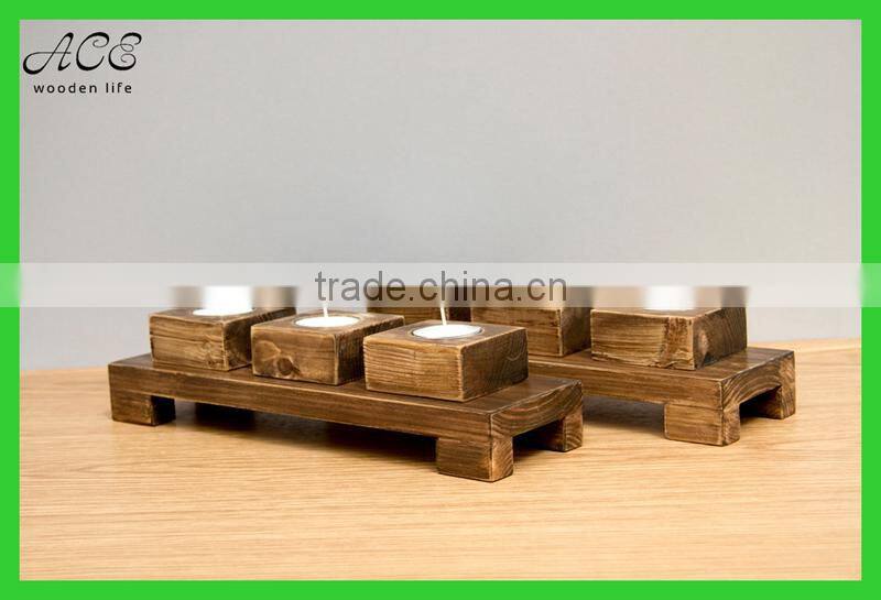 Antique wood candle holder