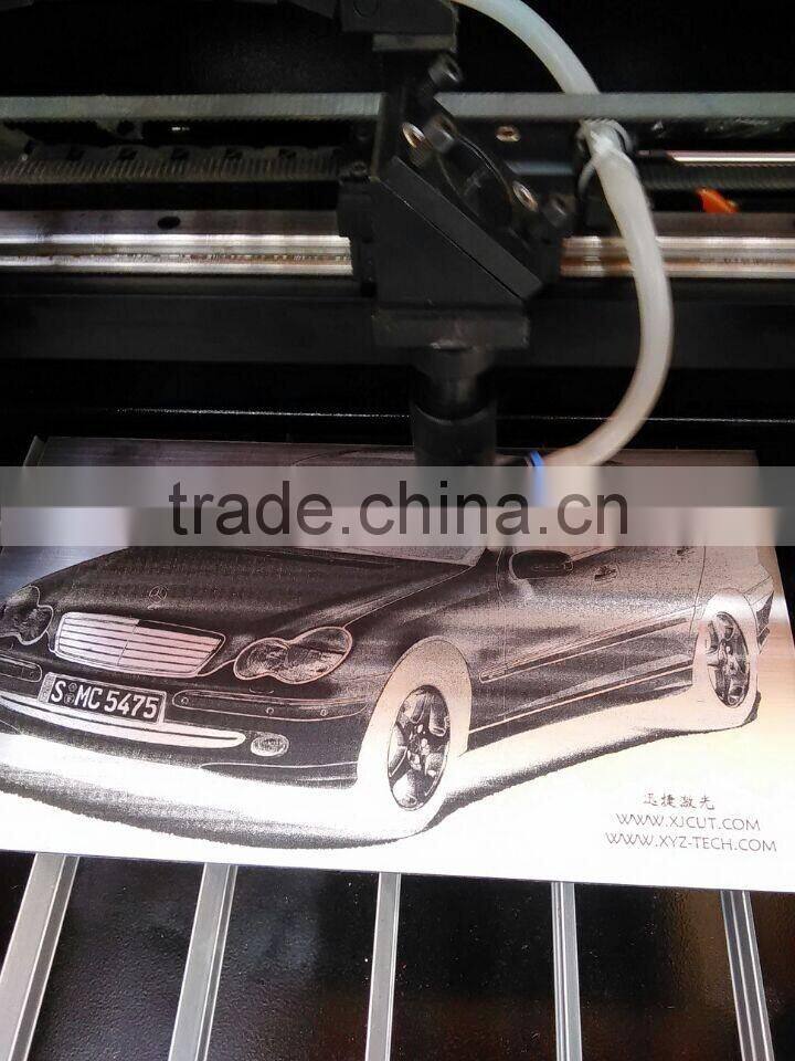 Factory direct sale new style wood acrylic CO2 laser engraving machine desktop laser cutting machine