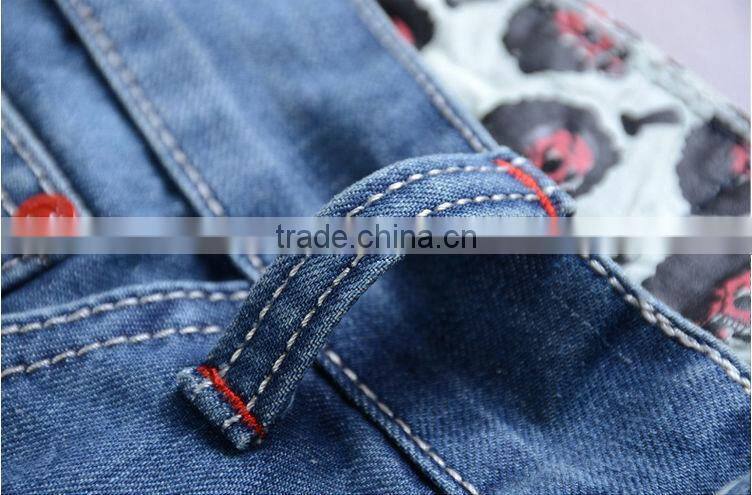2015 Ripped Slim100% Cotton Jeans top fashion men designer jeans stock men stone washing hole blue jean trouser with opera face