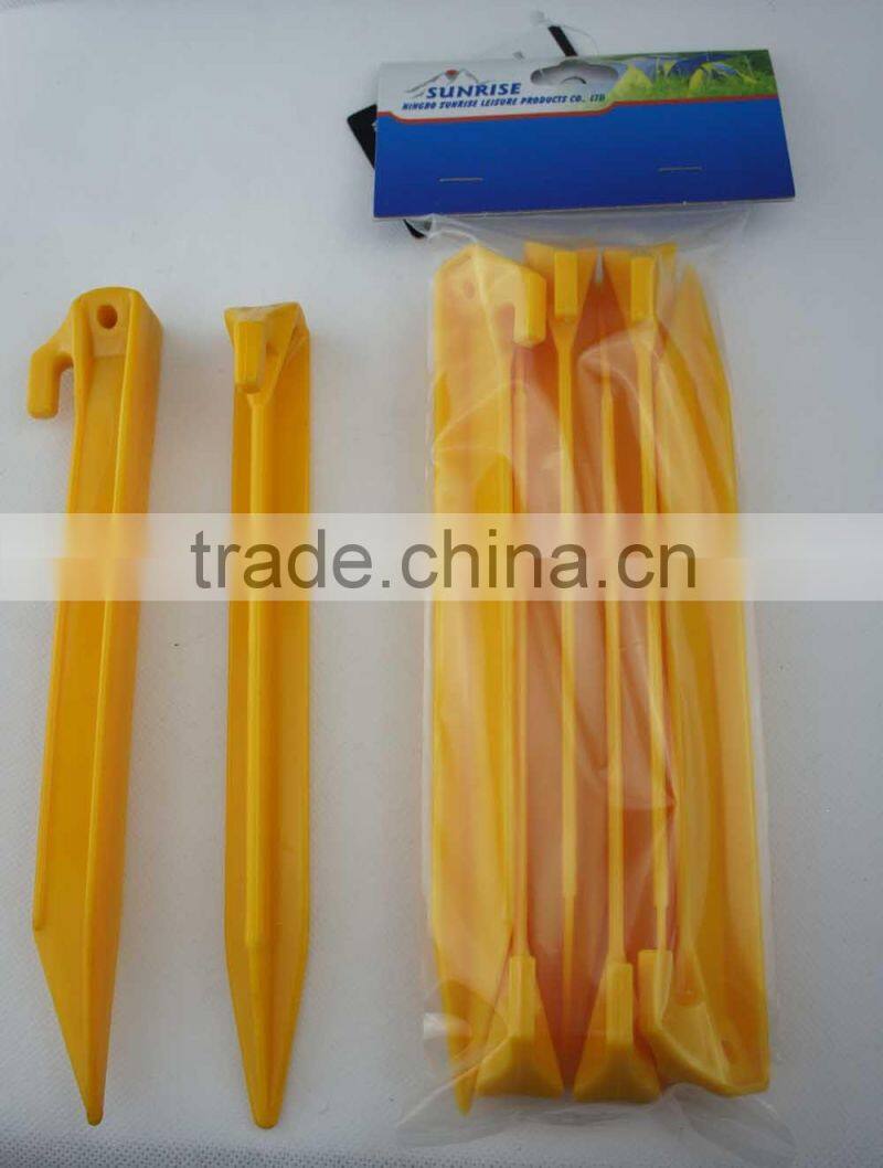 56712# 9" yellow plastic tent pegs