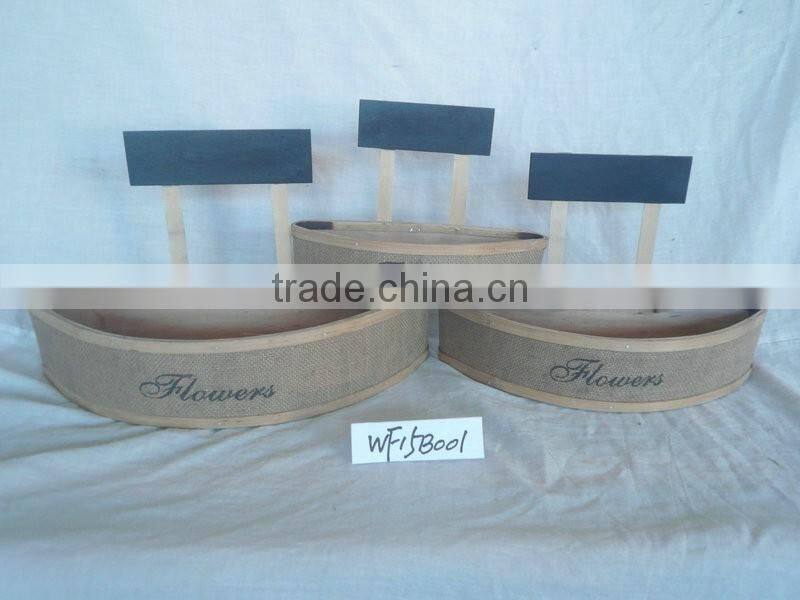 triangle wood flower pots decorated with blue wooden sign