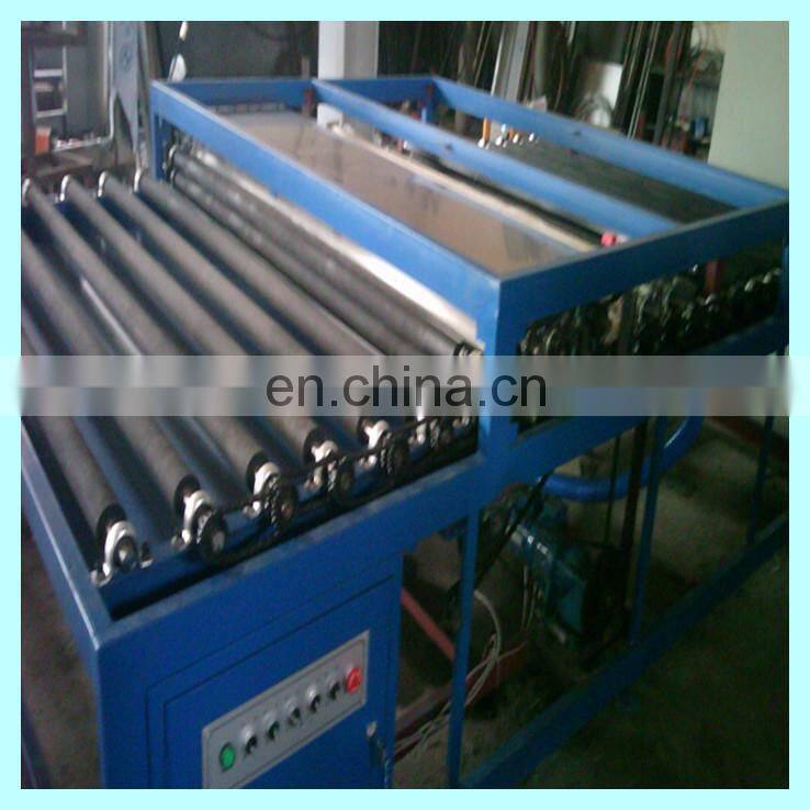 Heating and roller pressing machine for insulating glass produce