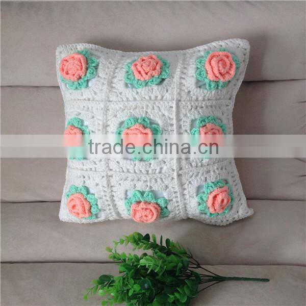 handmade white crochet cushion with flowers
