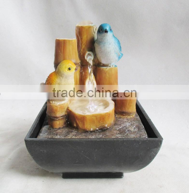 Resin banboo table water fountain with two birds on it