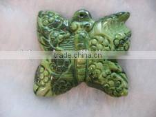 wholesale 35mm green butterfly carved natural coral pendant