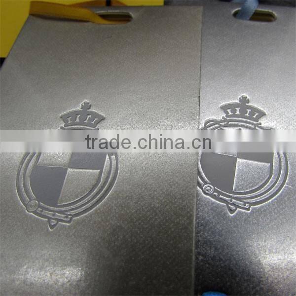 Shiny Silver Backpack Tags